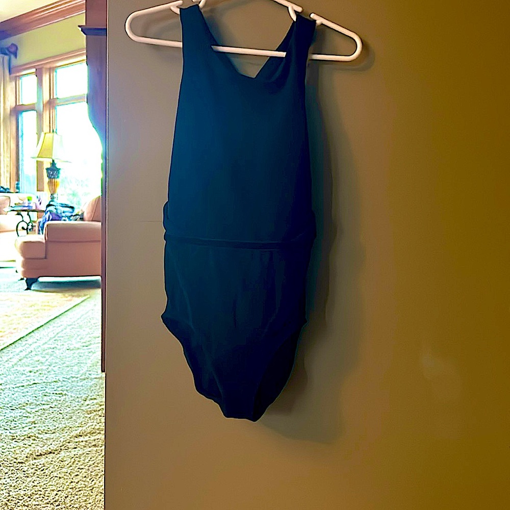Girls, black dance in gymnastics leotard